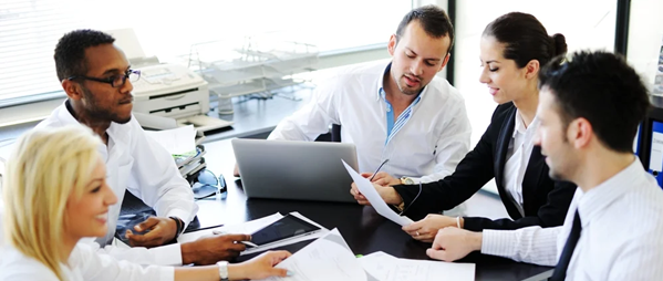 Business people working in office having meeting 600 x 254 px