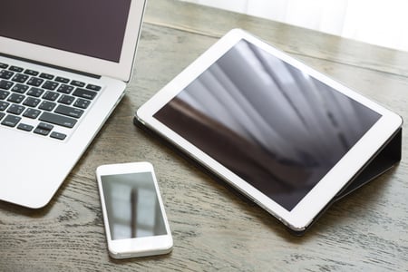 close-up-technological-devices-wooden-desk (1)